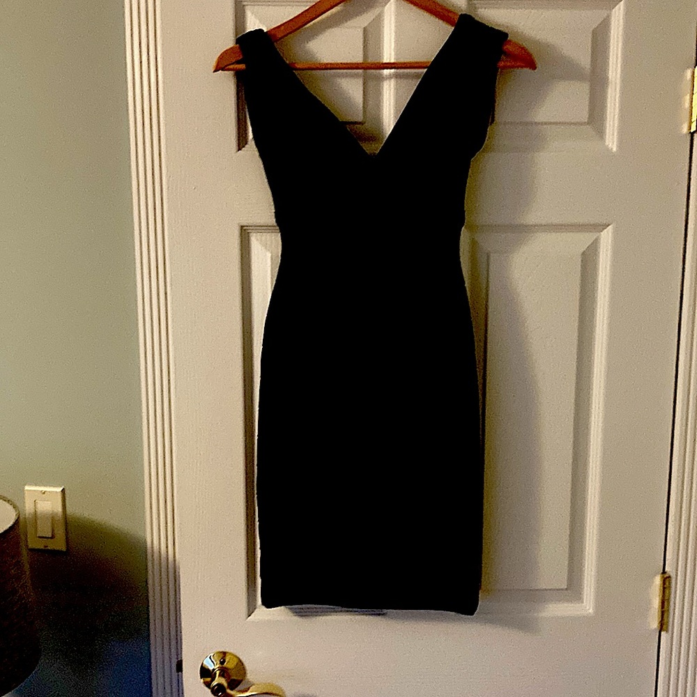 Herve Leger Black knee-length dress.